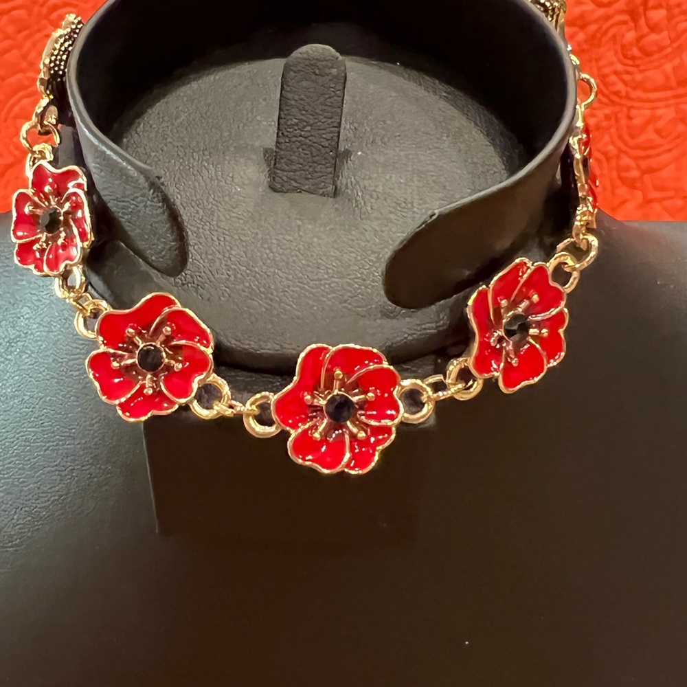 Black Austrian black crystal enameled poppy bracelet in goldtone
